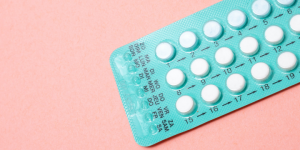 contraception on pink background