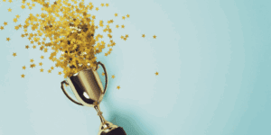 image of trophy and confetti